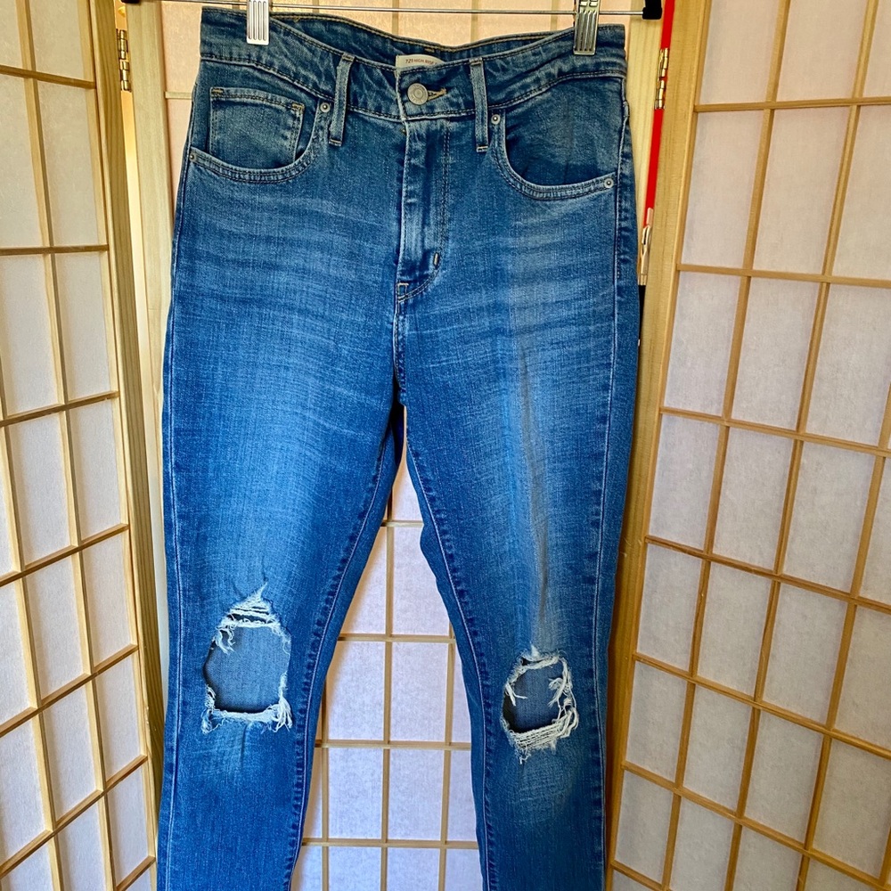 Levi’s 721 busted knee jeans